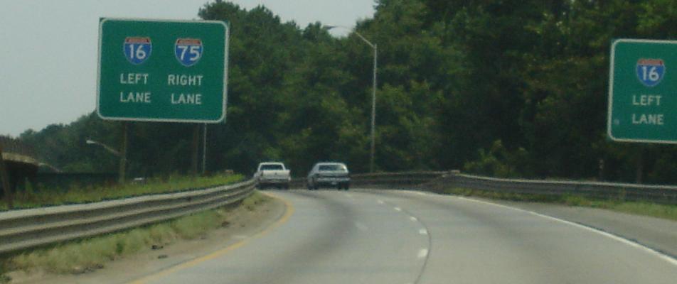 70 mph, 35 seconds, left rear view - lanes is full of trucks and cars